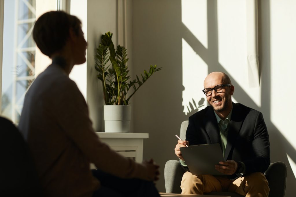Psychologist with his client
